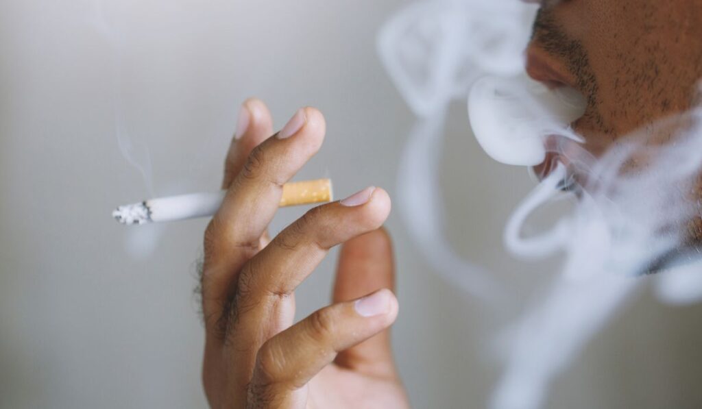 man smoking cigarette - Lynk Diagnostics man smoking cigarette