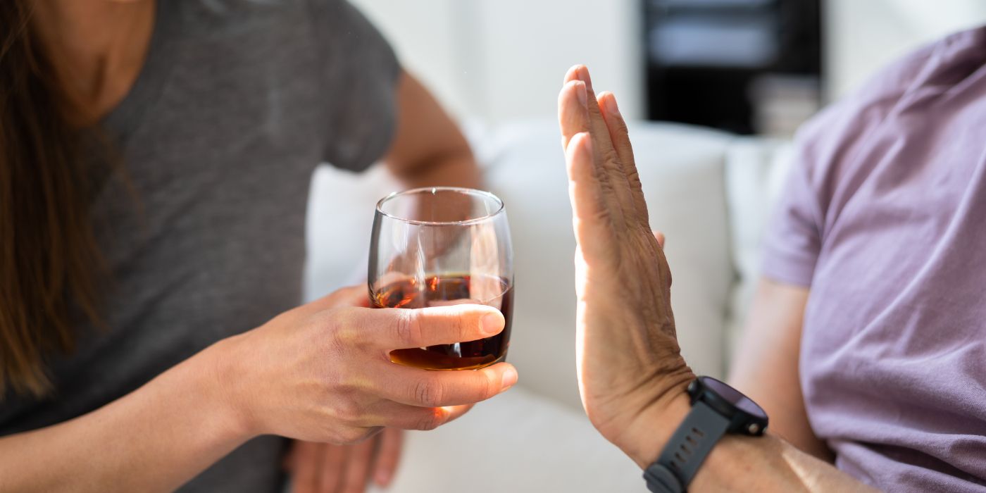 person saying no to liquor