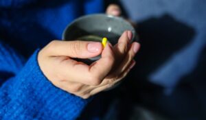 person taking a pill 1