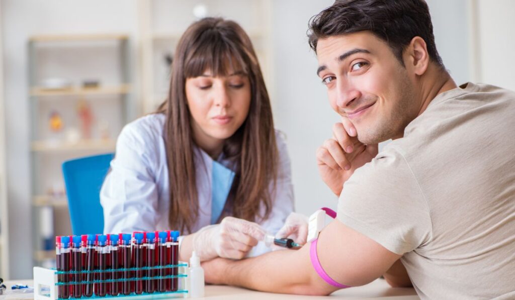 young man getting blood test done - Lynk Diagnostics young man getting blood test done