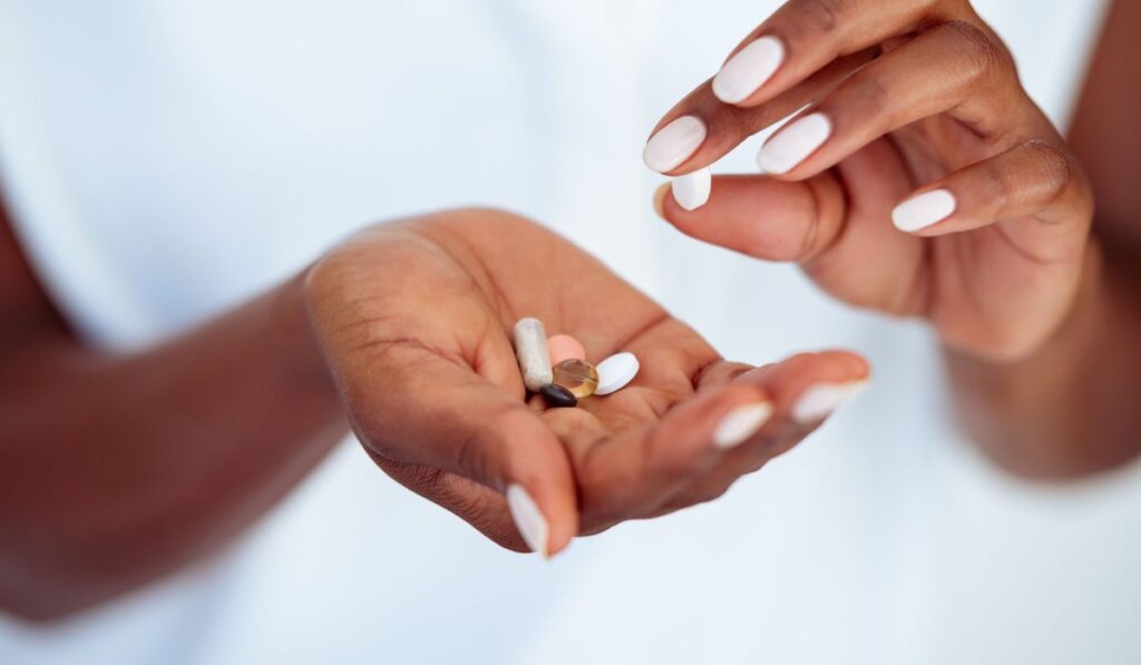 Trazodone pills in palm of hands