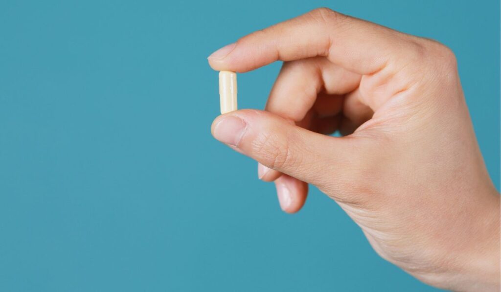 person holding a Venlafaxine pill